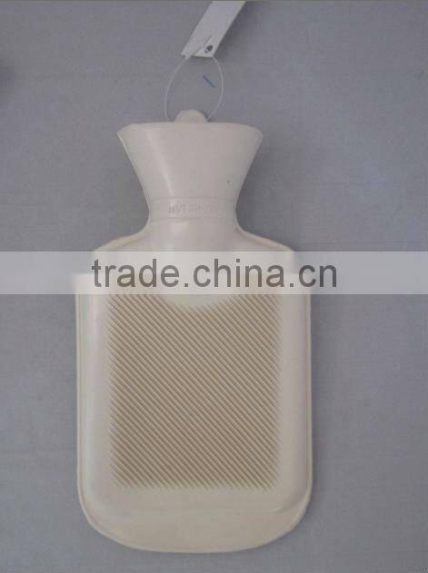 Colourful knitted cover and mini hot water bottle