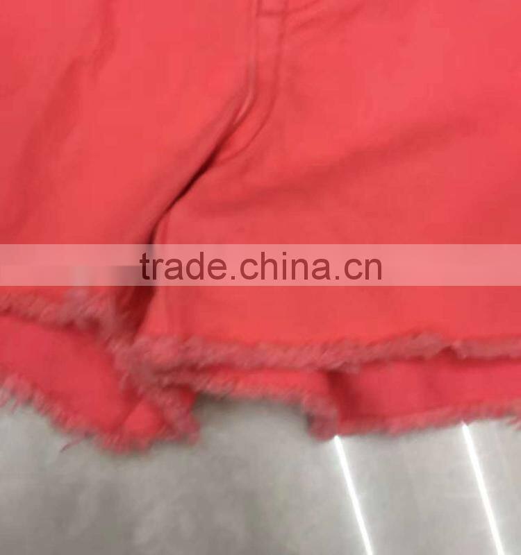 China stock garment suppliers branded girls stretch denim shorts