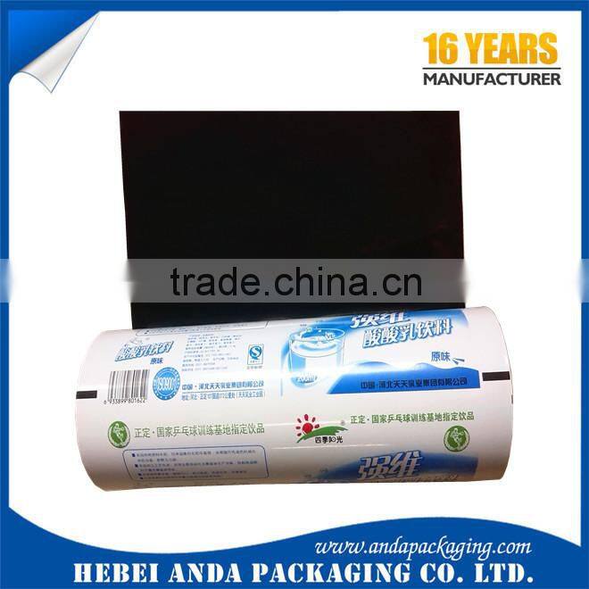 Milk black white film/ PE printed plastic film roll for liquid sachet packaging 220ml