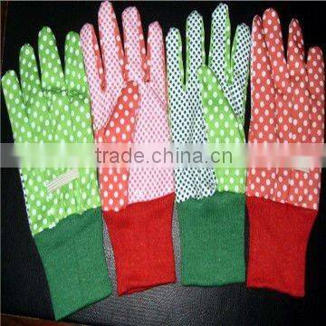 CanvaKnitted wrist gloves with PVC dots