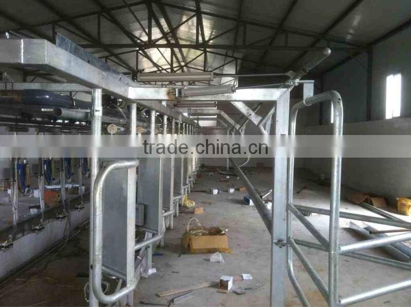 Milking Machine System with Automatic Cluster Remover