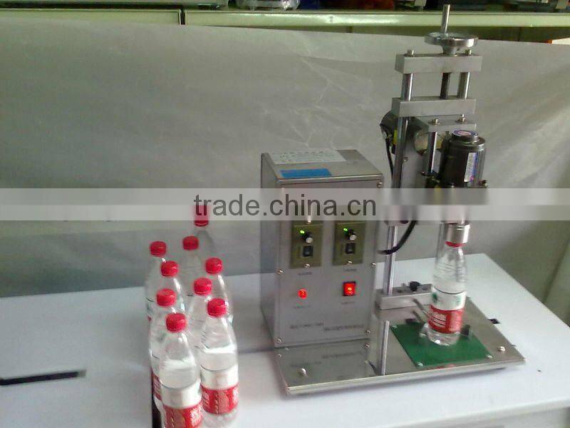 Semi-automatic spray head capping machine