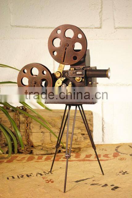 Antique metal movie camera model with paint