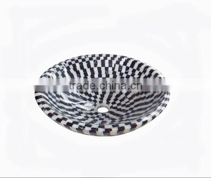 Polished black and white marble mosaic sink