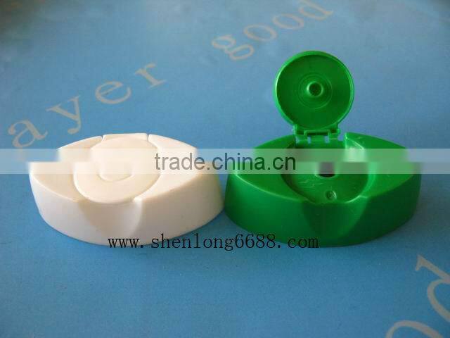 Plastic flip top cap for shampoo bottles