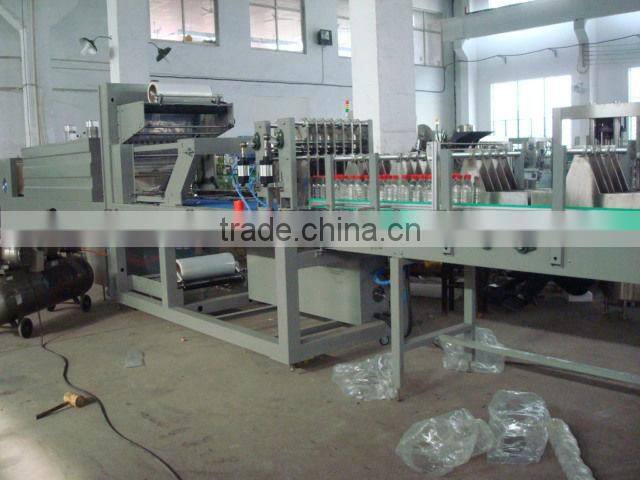 Group shrink machine for water bottles