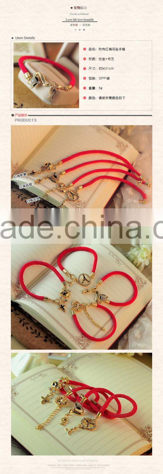 2015 promotional fashion bracelet , lovely skull fish tower pendent bracelet charm bracelet wholesale