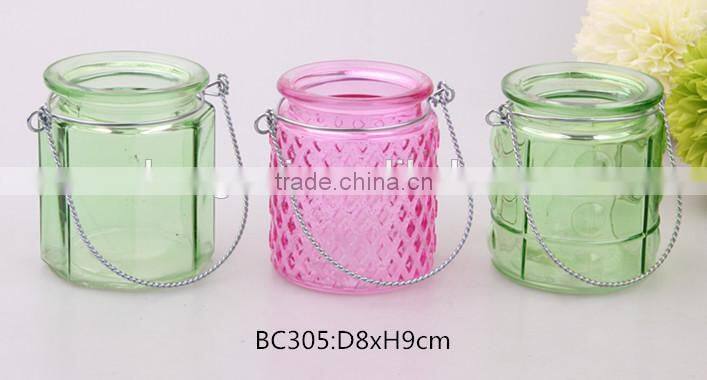 glass jar sprayed color with metal lifting handle