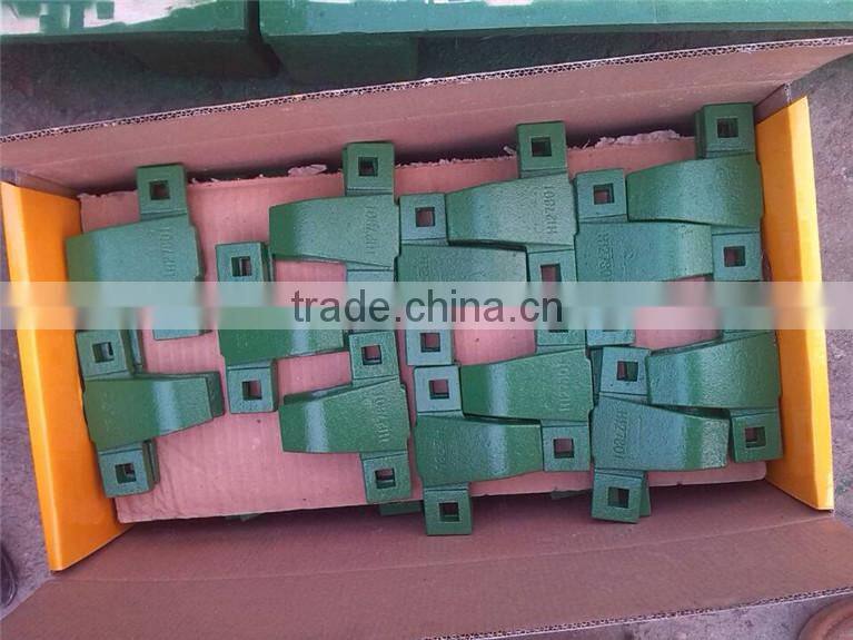 forged hold down clip for BISO harvester