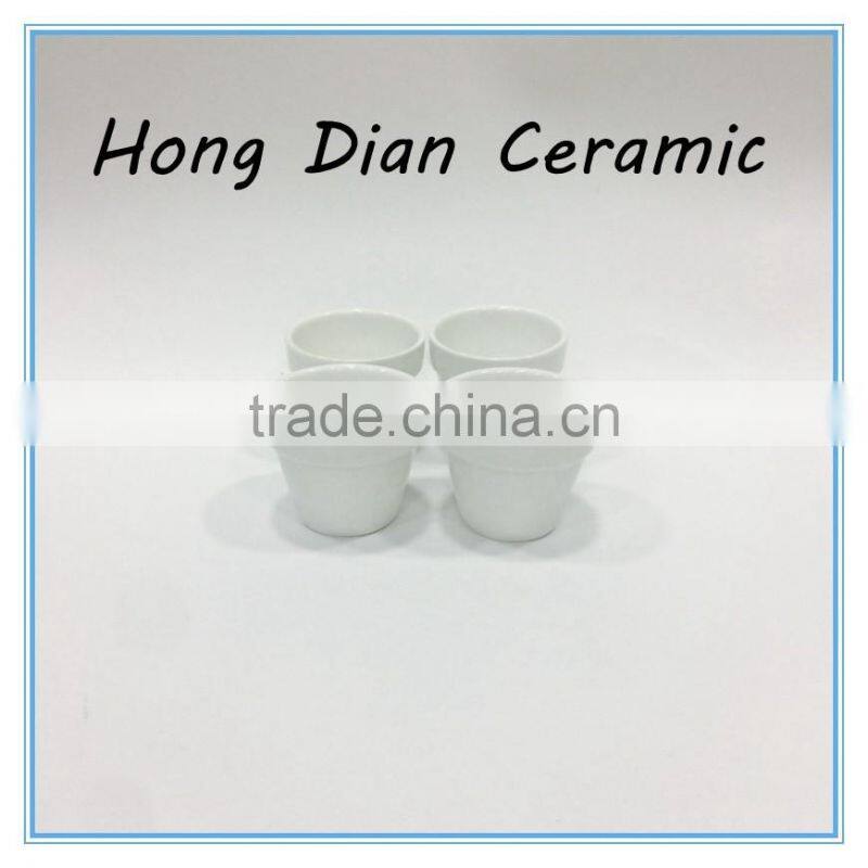 ceramic coffee cup and saucer with wood base