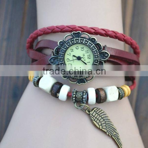 bulk buy from china Quartz watch F-05 for girls with Wing pendant,leather strap, bronzed watch case