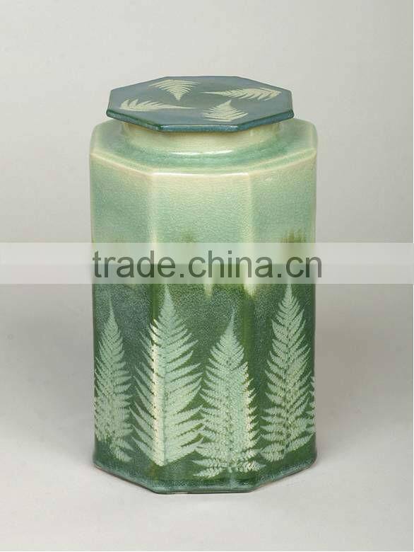 Ceramic cremation ashes container
