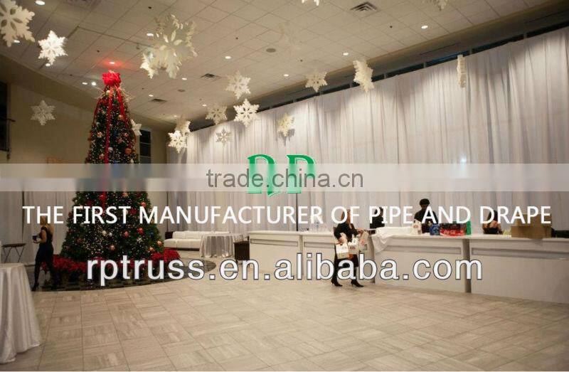 Portable Pipe and Drape photo booth with black and pin drapes