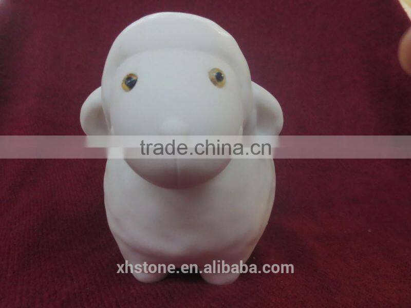 The small white rabbit stone statue,stone sculpture , stone craft