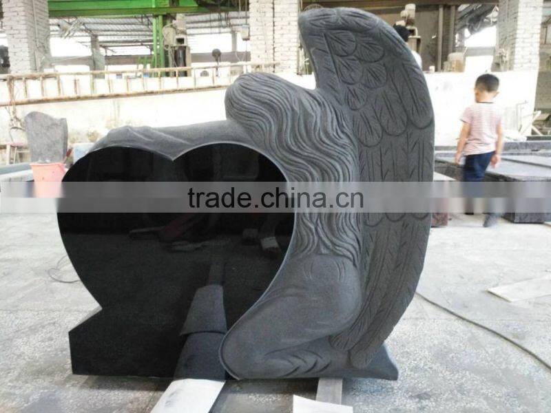 granite tombstone;angel with heart granite tombstone;hand carved headstone