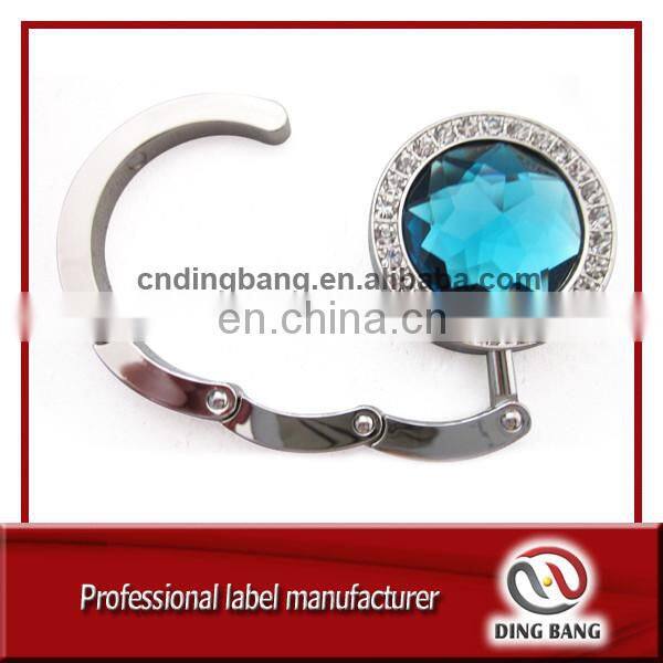 OEM Wholesale Stock Items Key chain Type And Promotion Souvenir Use Custom Blank Metal Gold Bag Hanger