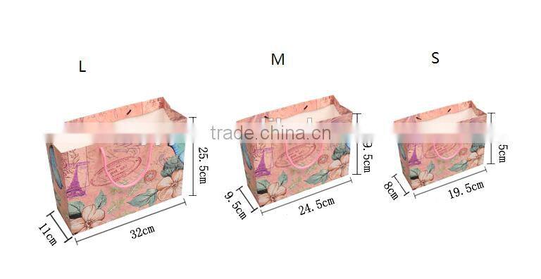 China brighten glossy limination paper bags for shopping with nylon handle