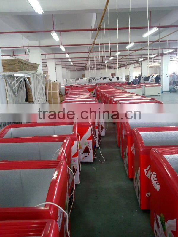 Curved glass door freezer with light box