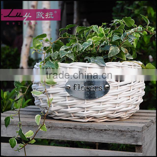 round cheap with metal logo white flower wicker basket