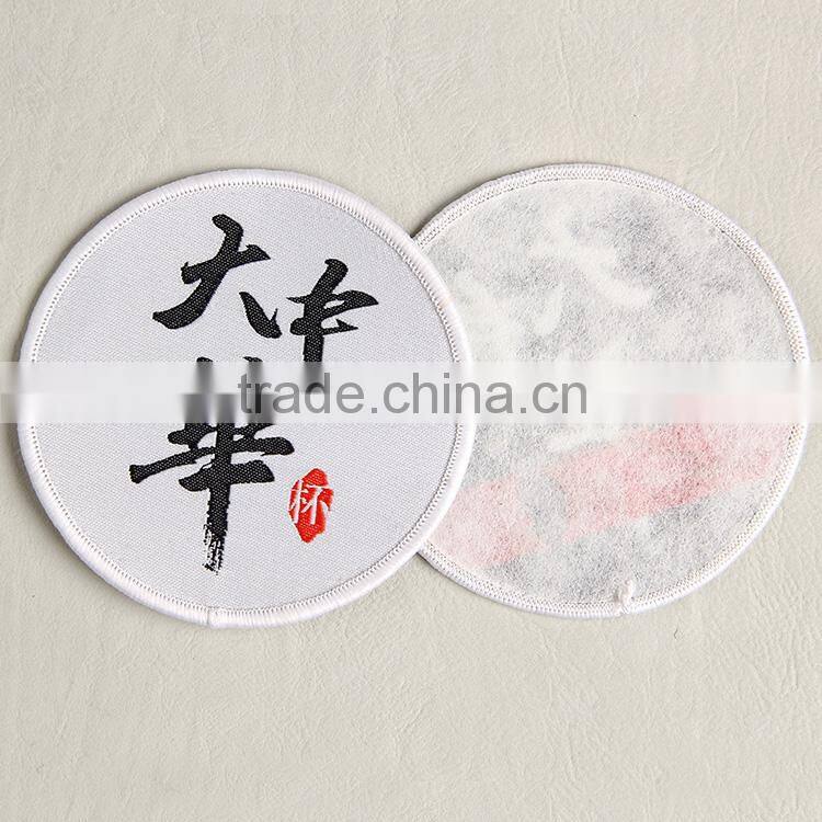 Hangzhou label company manufacture white woven badge label for cluture clothing