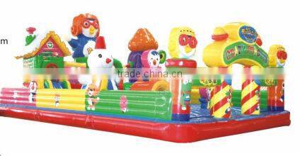 Children playing inflatable bouncing castle