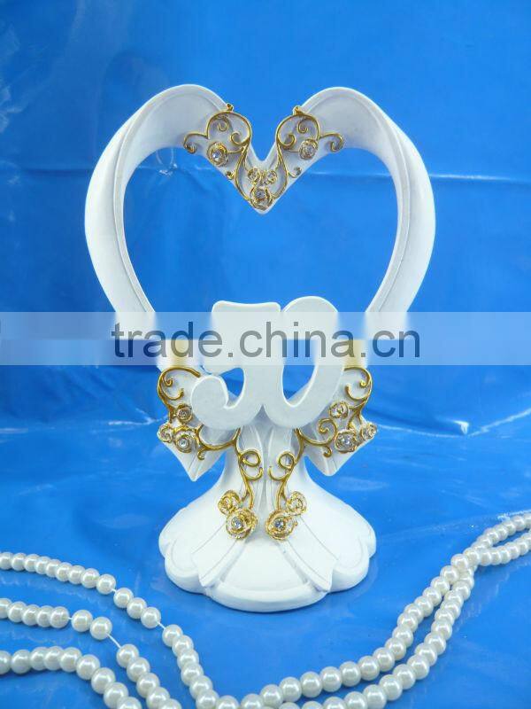 2014 hot selling resin heart wedding cake topprs