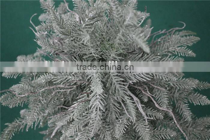 Holy and pure artificial Christmas tree in pot