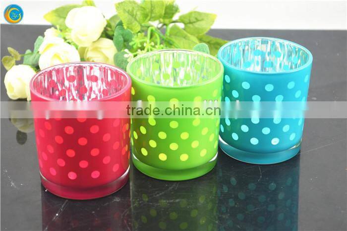 orange dotted glass candle holder