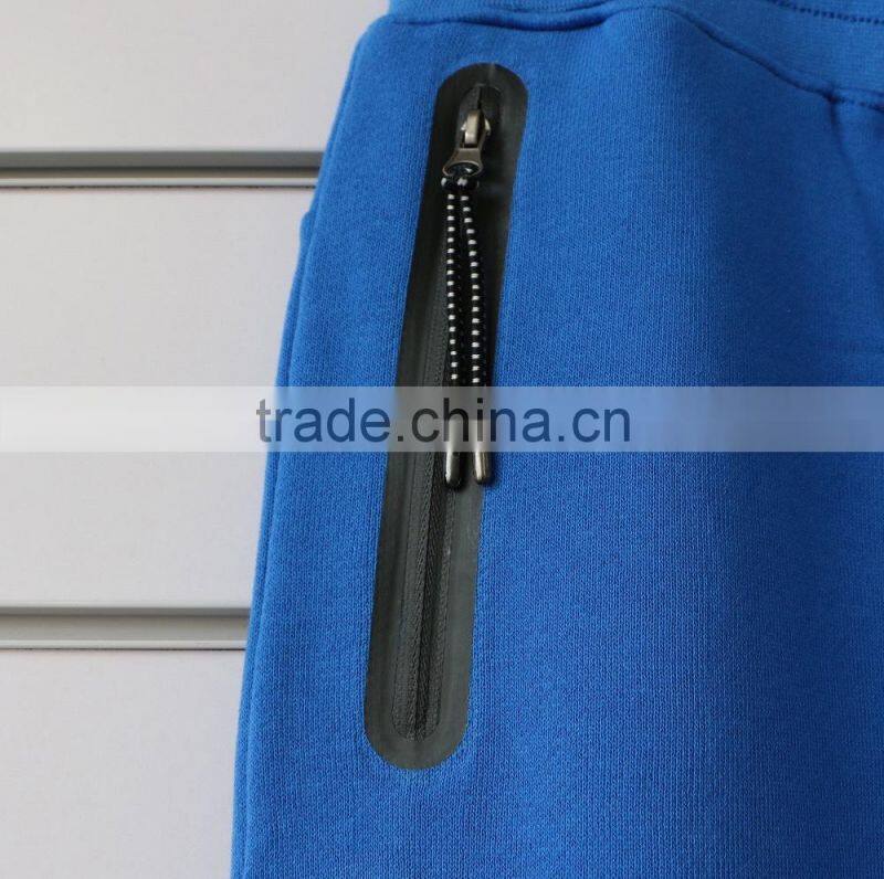 100% cotton men jogging pants with side waterproof pockets and logo print