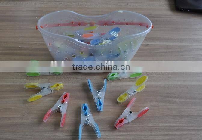 Clothes pegs with basket