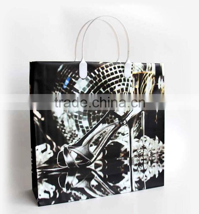 PE plastic gift bag with plastic handle