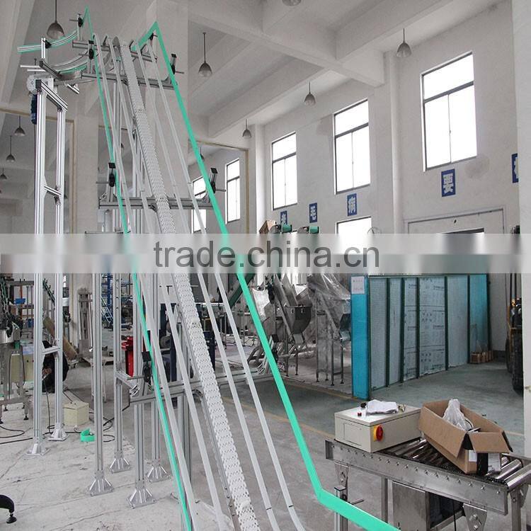 Vertical bottle clamping conveyors system