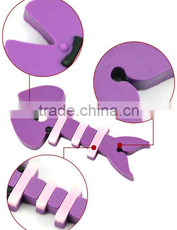 Supply creative fish bones earphone bobbin winder