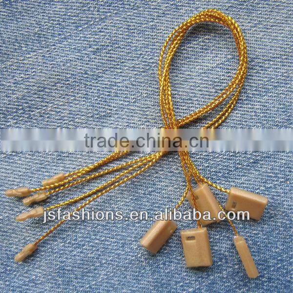 plastic tag with silver shiny string