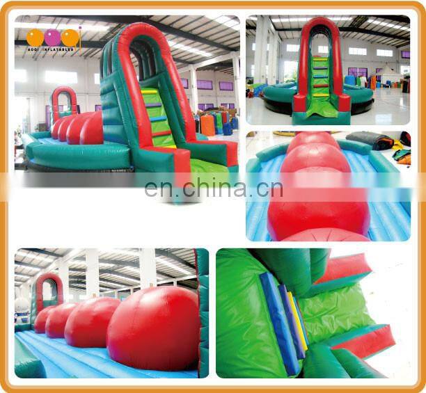 aoqi inflatable big ball obstacle game inflatable Wipeout Game for sale with free EN14960 certificate
