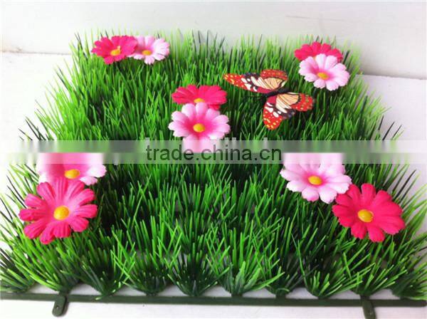 alibaba Beautiful artificial grass carpet with flower for garden decor