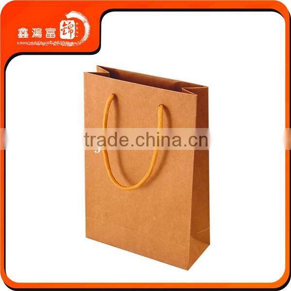 2016 XHFJ popular garment shopping paper bag design in craft paper