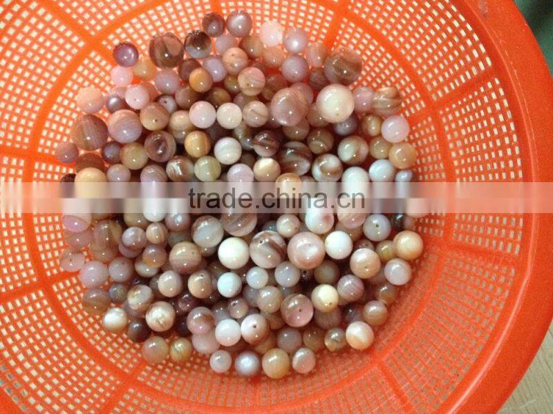 drilled American pink shell beads
