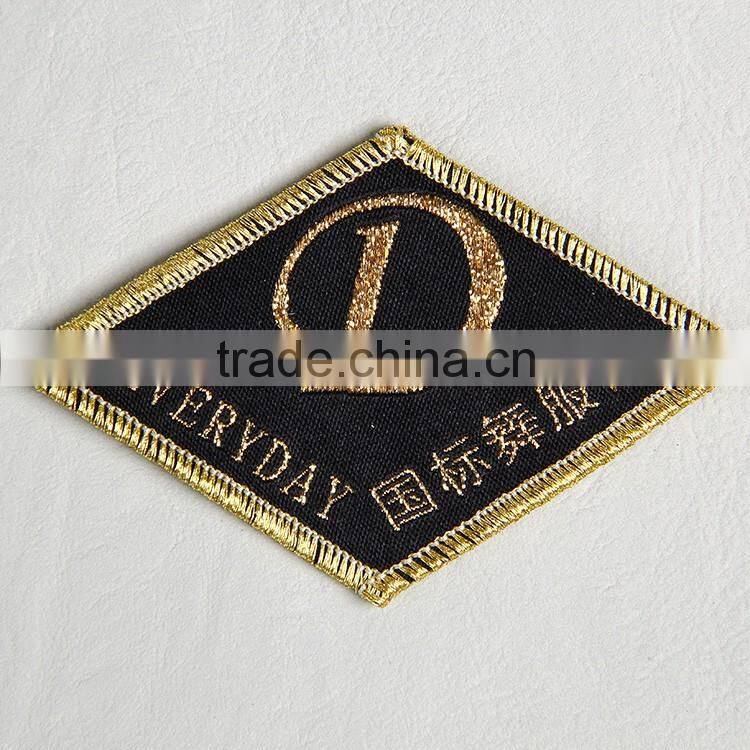 Diamoninternational dancing dressd embroidery patch with gold yarn for