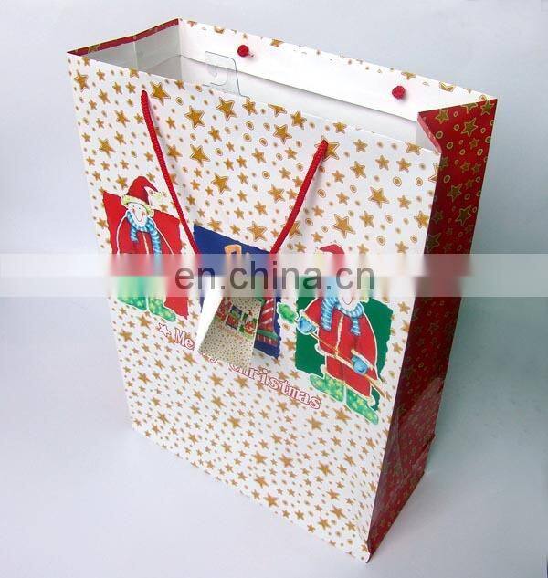 2014Garment package bag with rope handle Cheap white paper bag C1S gift paper bag