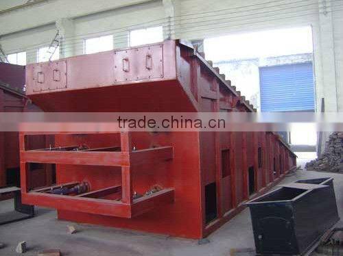 Reciprocating grate hot air generator