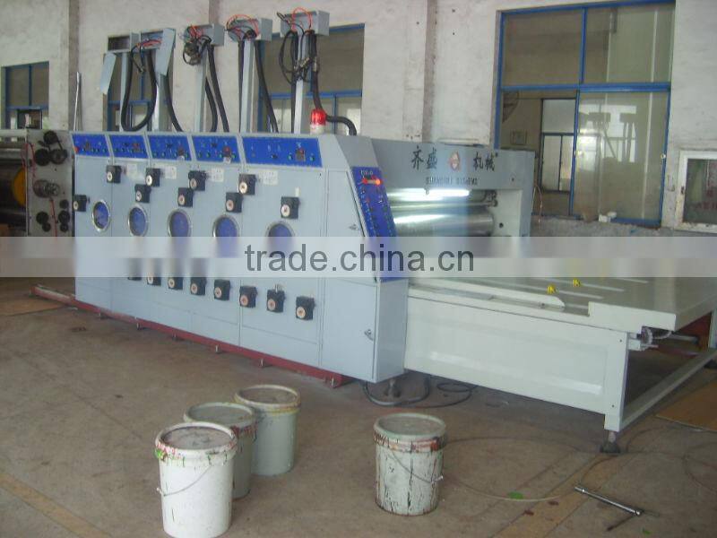 Automatic printing and slotting machine for carton box production plant