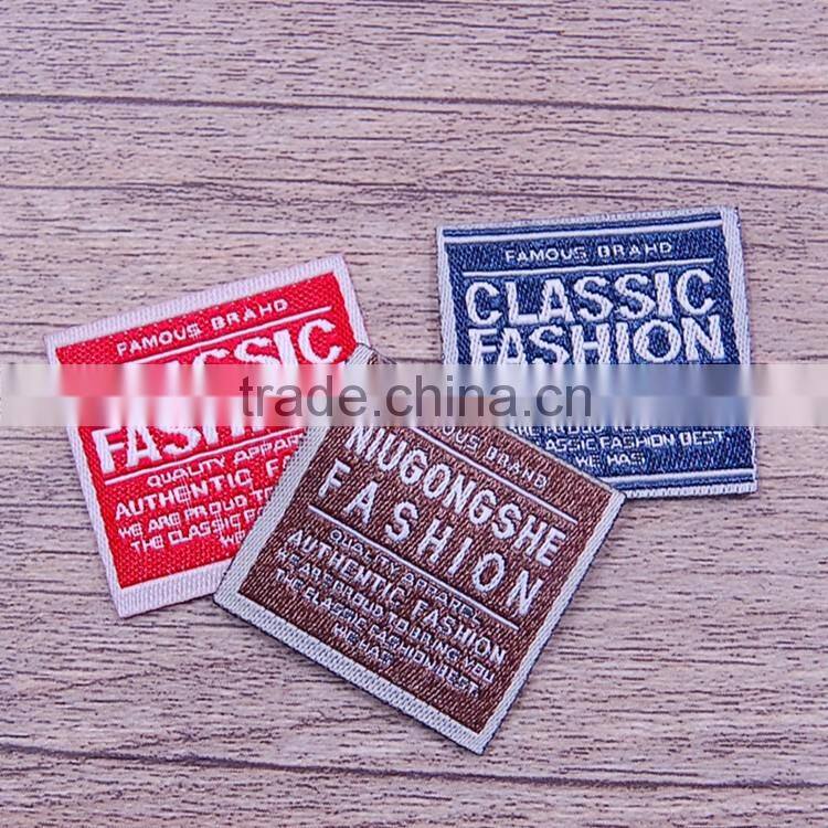 Private tow layer apparel jeans cloth blank label woven design manufacturers