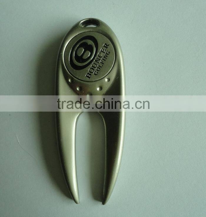 custom divot tool with golf ball marker