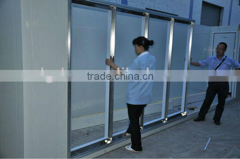 Glass door walk in cooler in supermarket