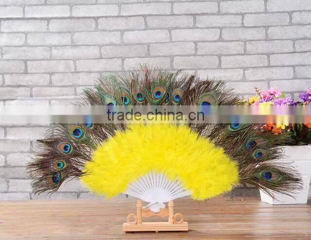 Colorful plastic peacock feather hand fan