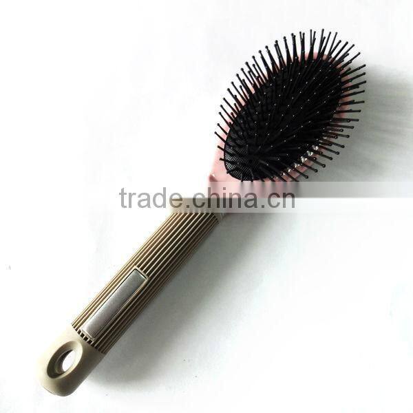 Steel pins plastic handle paddle hair brush