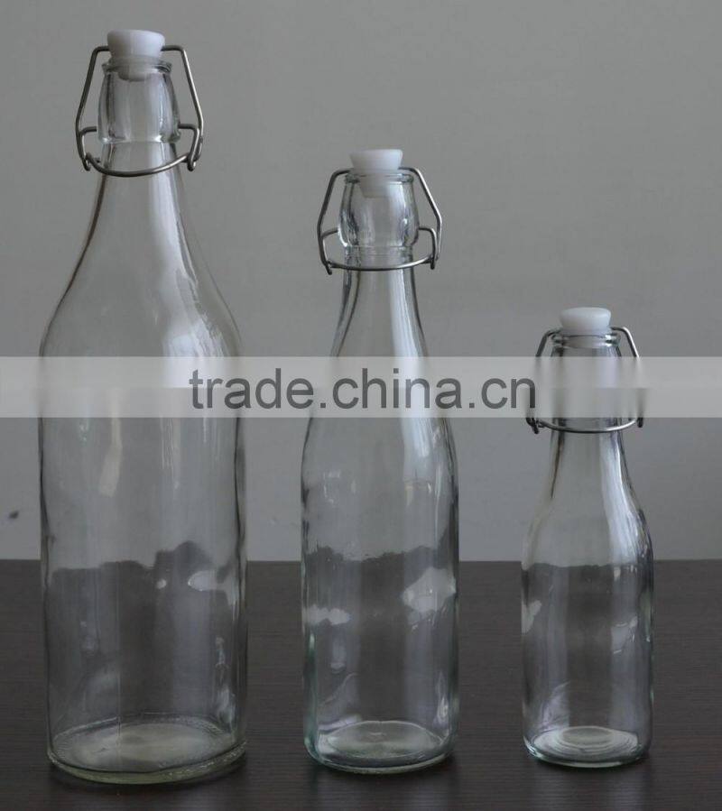 Food grade drinking swing top glass water bottle with stoppers