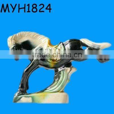 white ceramic horse sculpture