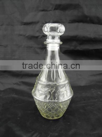 embossing glass shisky bottle with lid